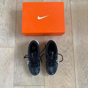 Nike kids baseball cleats, size 2